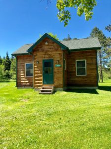 front view of snowmobile cabin for sale by christmas country homes