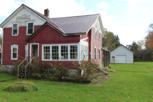 front view of home for sale in tug hill listed by christmas country homes