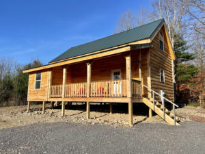 front view of brand new getaway cabin or tiny home for sale in florence new york listed by christmas country homes
