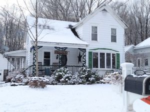 front view of 3 bedroom home for sale on snowmobile trail in taberg new york listed by christmas country homes