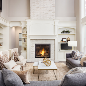 image of cozy fireplace in modern home to show how to prep Your Home for Colder Months